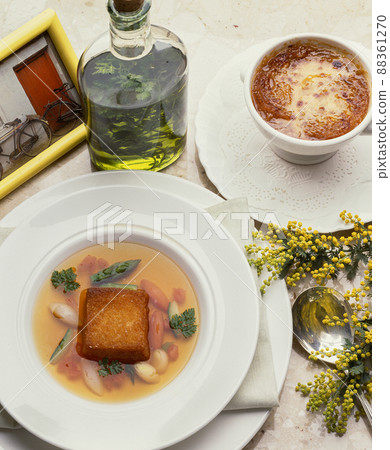 Spring vegetable consomme soup Spring vegetable consomme soup 88361270