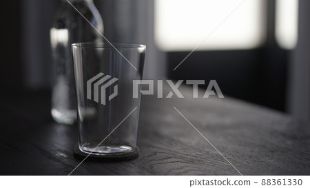 tonic water with tumbler glass on wood table tonic water with tumbler glass on wood table 88361330