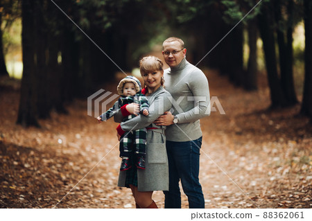 Beautiful and happy family with little child in Beautiful and happy family with little child in 88362061