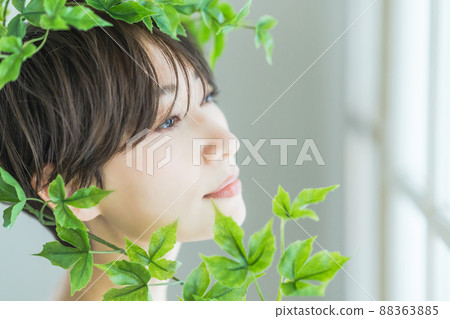 Female botanical beauty image wearing plants Female botanical beauty image wearing plants 88363885