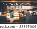 Blur Coffee Cafe Shop and Bokeh Light Bulb Background. Defocused Image and Blur Customer People in Coffee Counter Shop. Blur Cafe Store Shop Lifestyles and Client Service Food Event 88365006