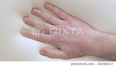 Touching and pressing a memory foam bed and pillow Touching and pressing a memory foam bed and pillow 88366027