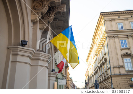 Ukrainian flag in city building. War in Ukraine 88368137
