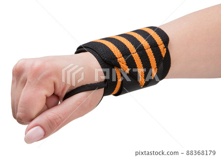 female hand with a striped fitness wristband, from sprains, concept on a white background 88368179