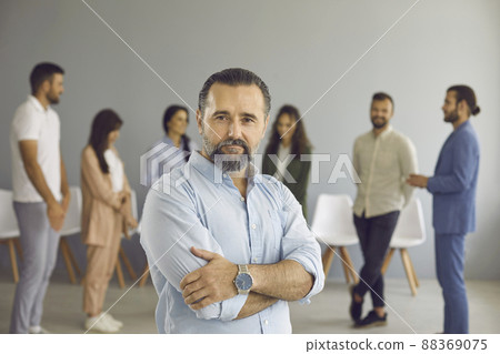 Portrait of successful handsome mature businessman, business speaker or company leader Portrait of successful handsome mature businessman, business speaker or company leader 88369075