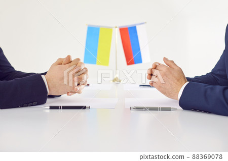Representatives of Ukraine and Russia negotiating in order to sign peace treaty and stop war Representatives of Ukraine and Russia negotiating in order to sign peace treaty and stop war 88369078