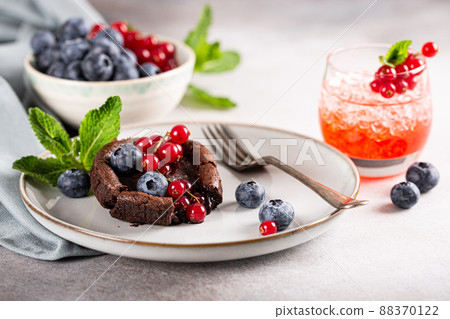 Delicious chocolate fondant or lava cake Delicious chocolate fondant or lava cake 88370122