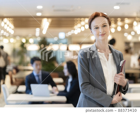 Business woman portrait looking at camera Business woman portrait looking at camera 88373410