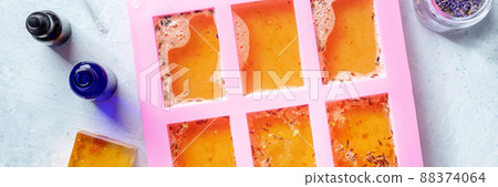 Handmade soap, the process of making, panoramic banner. Liquid glycerin Handmade soap, the process of making, panoramic banner. Liquid glycerin 88374064