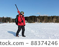 Man with a mountain  skis going to training  88374246