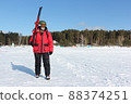 Man with a mountain  skis going to training  88374251