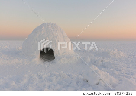 igloo on the snow  at sunset, Novosibirsk, Russia 88374255