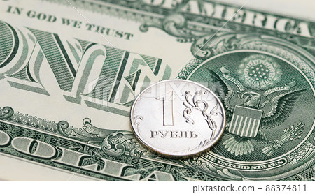 1 ruble coin against the background of 1 US dollar note 1 ruble coin against the background of 1 US dollar note 88374811