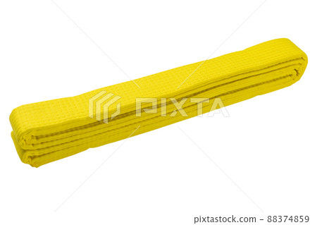 yellow belt for a sports kimono, the belt is folded, on a white background yellow belt for a sports kimono, the belt is folded, on a white background 88374859
