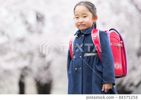 Girl entering elementary school Girl entering elementary school 88375258