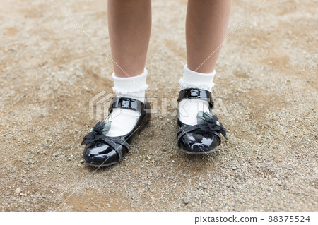 Girl entering elementary school 88375524