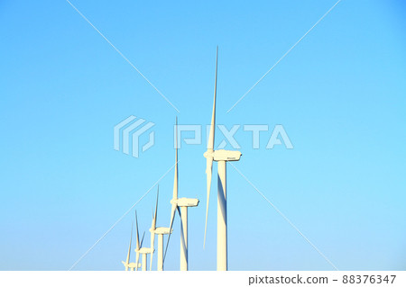Atsumi Peninsula, a landscape of windmills lined up in a straight line 88376347