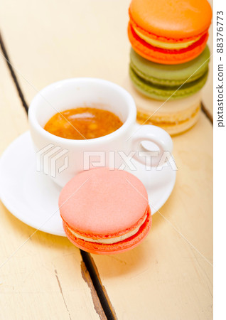 colorful macaroons with espresso coffee colorful macaroons with espresso coffee 88376773