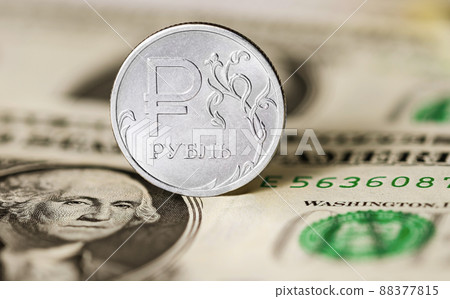 Russian ruble coin against the background of 1 US dollar note Russian ruble coin against the background of 1 US dollar note 88377815
