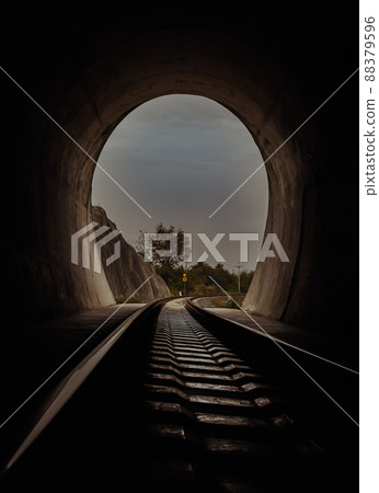 Inside the railroad tunnel and railways with natural light at the end. Light at the end of the tunnel, Lights and shadows, Concept of achieving your goals, 88379596