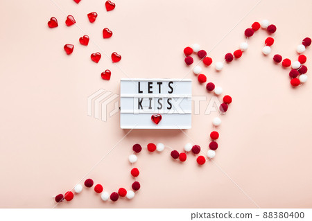 Letter board on pink background. Top view. Romantic background for Valentine's day 88380400