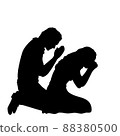 Silhouettes of man and woman pray. 88380500