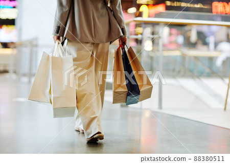 Girl with Shopping Bags in Mall Minimal Girl with Shopping Bags in Mall Minimal 88380511