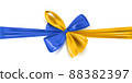 Realistic bow, ribbons in colors of Ukrainian flag, isolated on white background. Ukraine symbol of freedom. Vector illustration 88382397
