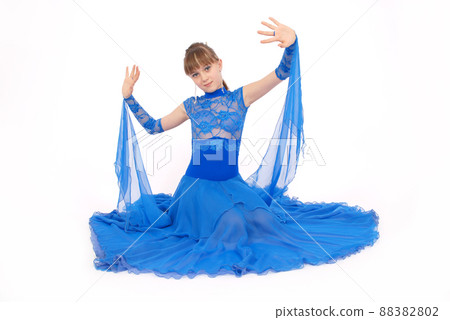 girl in blue dress posing in studio girl in blue dress posing in studio 88382802