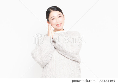 A woman who aligns hands and makes a pose of your request A woman who aligns hands and makes a pose of your request 88383465