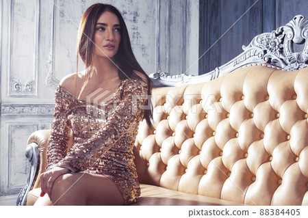 young pretty brunette woman posing in luxury hotel room interior, lifestyle rich people concept young pretty brunette woman posing in luxury hotel room interior, lifestyle rich people concept 88384405