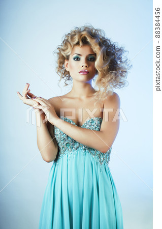 beauty blond woman with curly hair close up isolated, fashion makeup and style 88384456