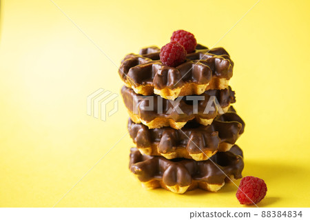 waffle; chocolate; crispy; fruit; berries; raspberry; viennese; sweet food; belgian waffle; milk; wooden; plate; creative; baked; bakery; belgian; breakfast; brown; calories; treat; sugar; lunch; swee waffle; chocolate; crispy; fruit; berries; raspberry; viennese; sweet food; belgian waffle; milk; wooden; plate; creative; baked; bakery; belgian; breakfast; brown; calories; treat; sugar; lunch; swee 88384834