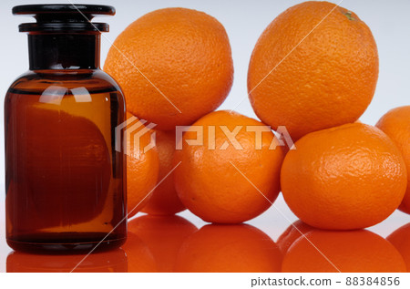Medicine bottle against a background of orange. 88384856