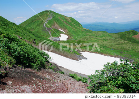 View of Mt. Yokodake from Mt. Akita Komagatake, an active volcano 88388314