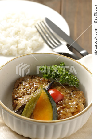 Rice and coarse hamburger steak with stewed vegetables and parsley Rice and coarse hamburger steak with stewed vegetables and parsley 88389615