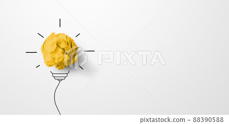 Paper scrap ball yellow colour with light bulb symbol on white background Paper scrap ball yellow colour with light bulb symbol on white background 88390588