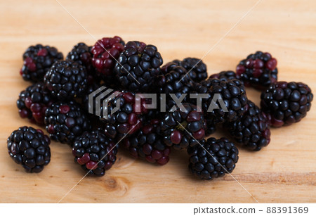Blackberries on wooden table 88391369