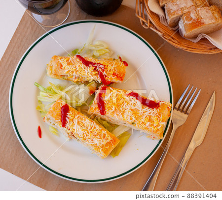 Pastel de verano - delicious summer cake with sliced bread, ham, cheese, surimi, mayonnaise Pastel de verano - delicious summer cake with sliced bread, ham, cheese, surimi, mayonnaise 88391404