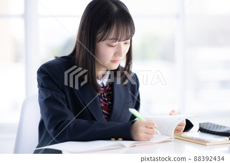 Portrait of a high school girl studying 88392434