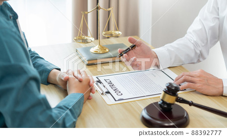 Law consultancy concept A male lawyer finding out some vague information on the contract and asking for more explanation. Law consultancy concept A male lawyer finding out some vague information on the contract and asking for more explanation. 88392777