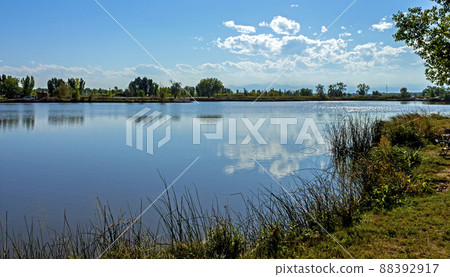 Reflection of clouds in the water. 88392917