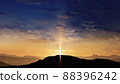 Bright cross on the hill with clouds moving on the starry sky 88396242