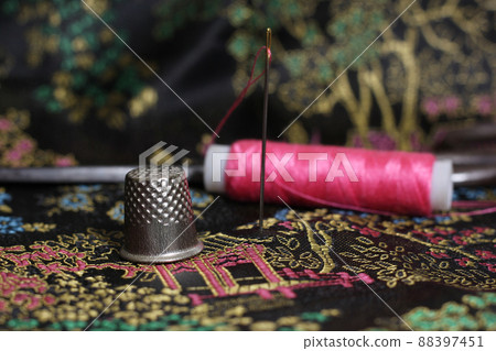 Pink Thread and Thimble on Vintage Chinese Black Silk 88397451