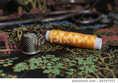 Yellow Thread and Thimble on Vintage Chinese Black Silk 88397453