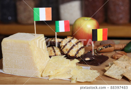 Irish Cheese With Belgian Chocolate and Coconut Macaroons in Rustic Kitchen 88397483
