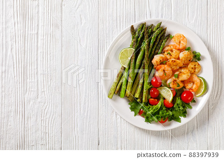 toasty asparagus with fried prawns, lime and salad toasty asparagus with fried prawns, lime and salad 88397939