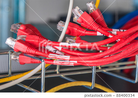 red patch cables connected to ethernet ports of the switch 88400334