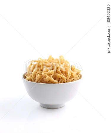 Bowl of cooked noodles isolated on white background 88402329