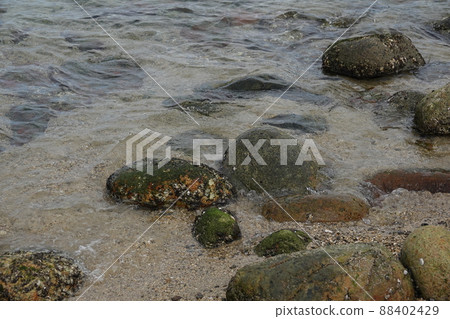 Kashiwajima sandy beach and rocks 88402429